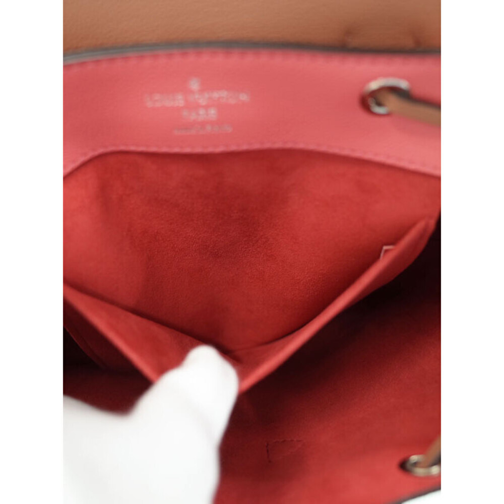 Louis Vuitton Lock Me Backpack - Picture 6 of 9